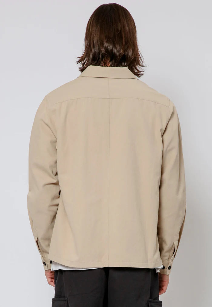 Religion cazadora beige