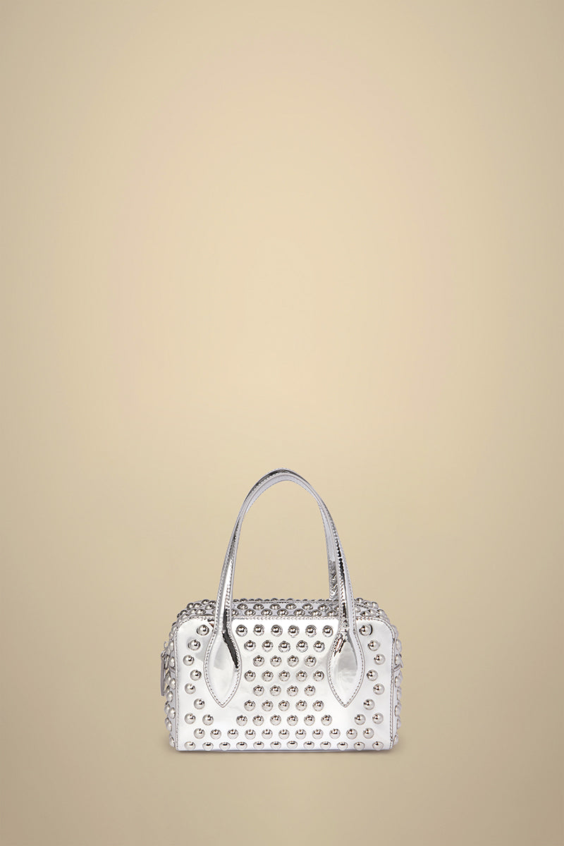 Liviana Conti bolso mini plata tachas