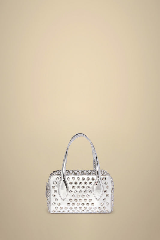 Liviana Conti bolso mini plata tachas