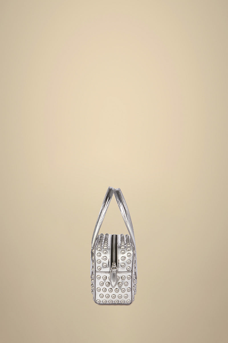 Liviana Conti bolso mini plata tachas