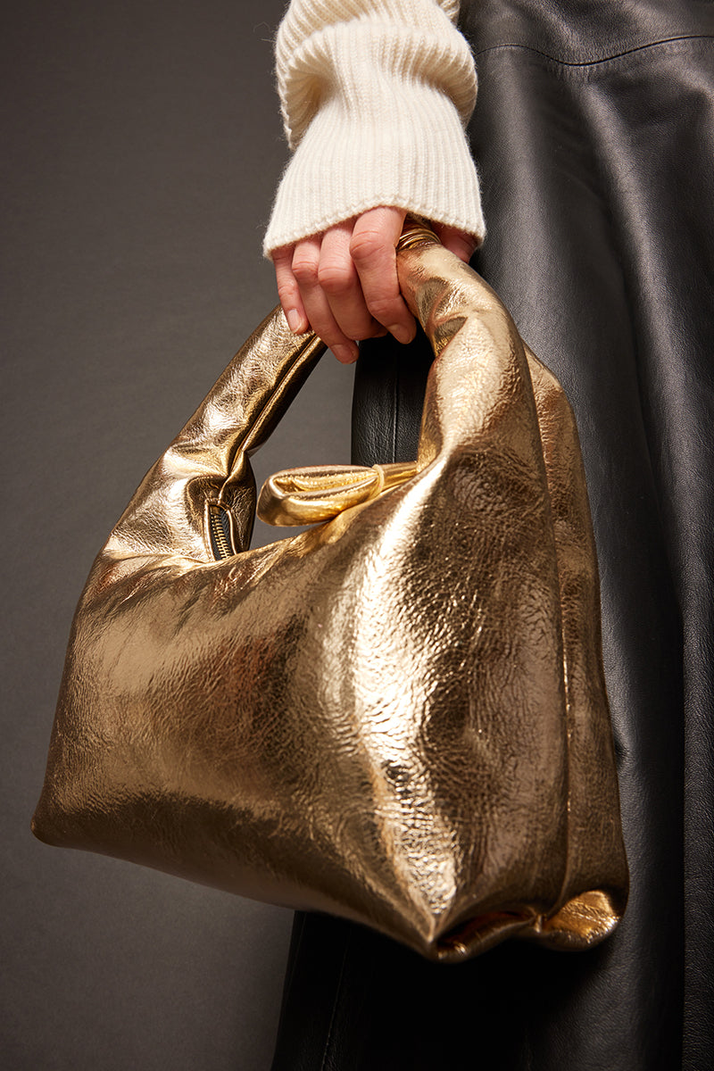 Liviana Conti bolso dorado
